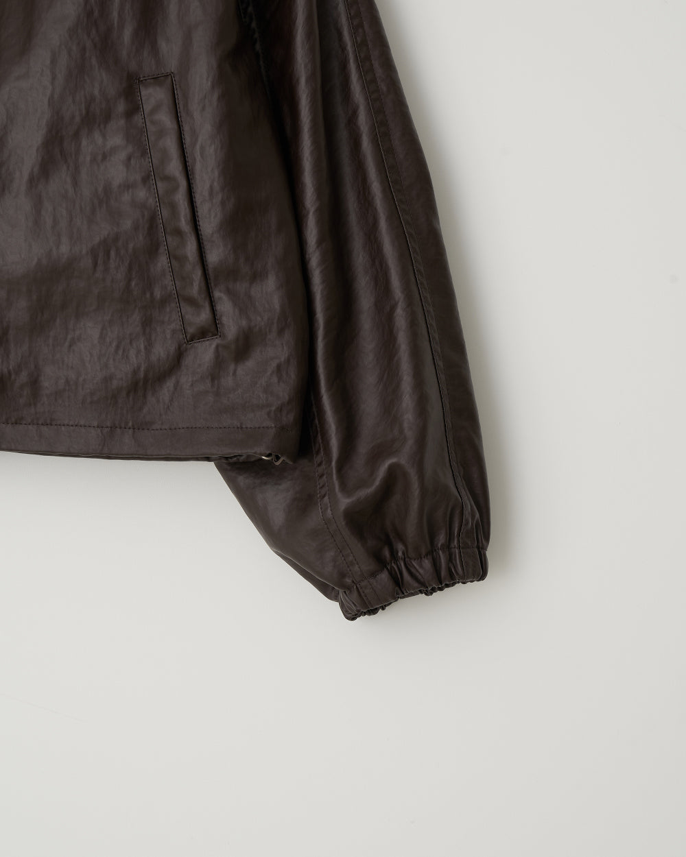 Coated wind zip up